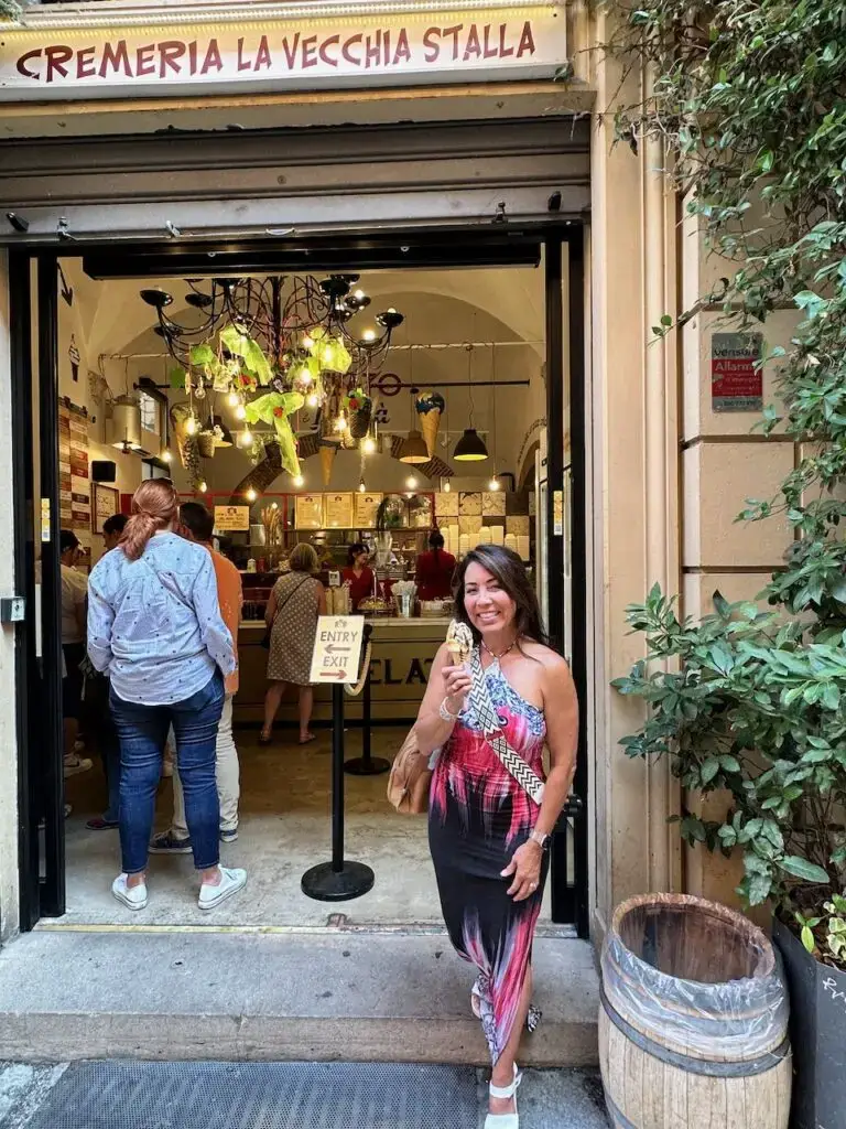 Phoebe Chongchua Pollard with ice cream in front of Cremeria La Vecchia Stalla