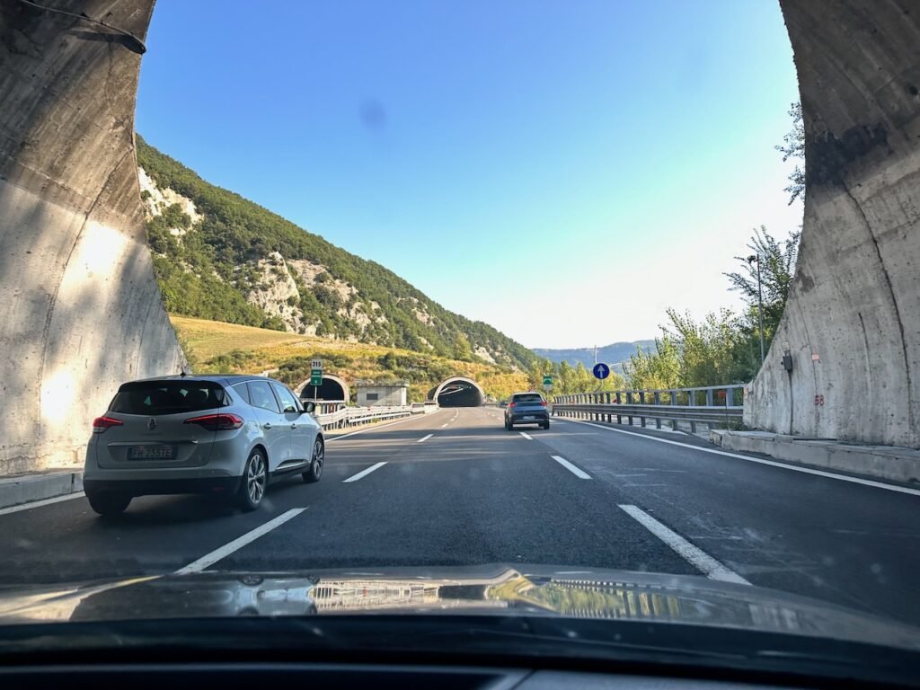 cars driving through tunnels to Bologna
