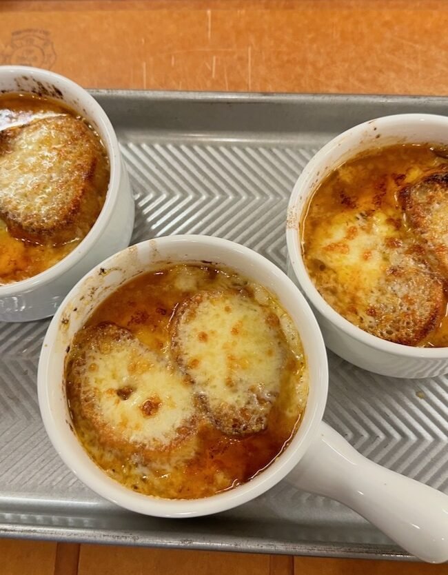 Bowls of French Onion Soup ready to eat