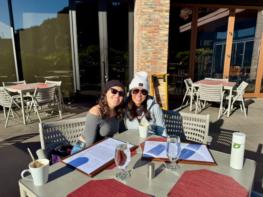 Outdoor breakfast on the patio at Enchantment Resort with canyon views and morning sun.
