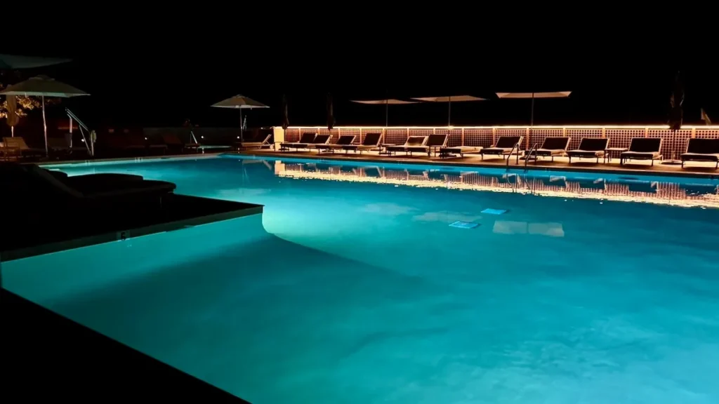 Luxury pool at Enchantment Resort Sedona glowing at night in Boynton Canyon.