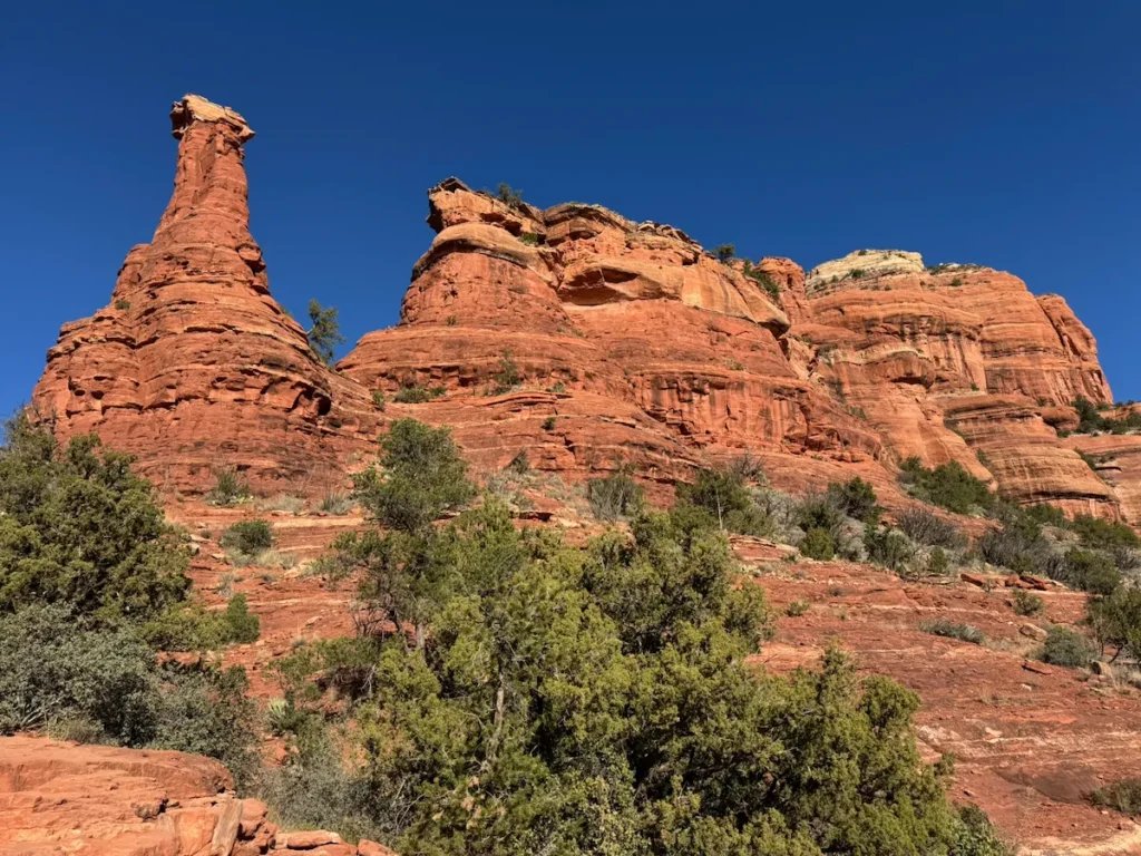 Towering red rock formations along the Boynton Canyon Trail in Sedona, Arizona.