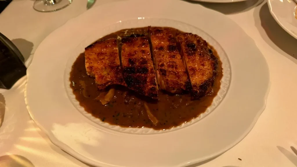 Chicken alla griglia at Torrisi Restaurant & Bar in New York City, grilled and served with a rich sauce