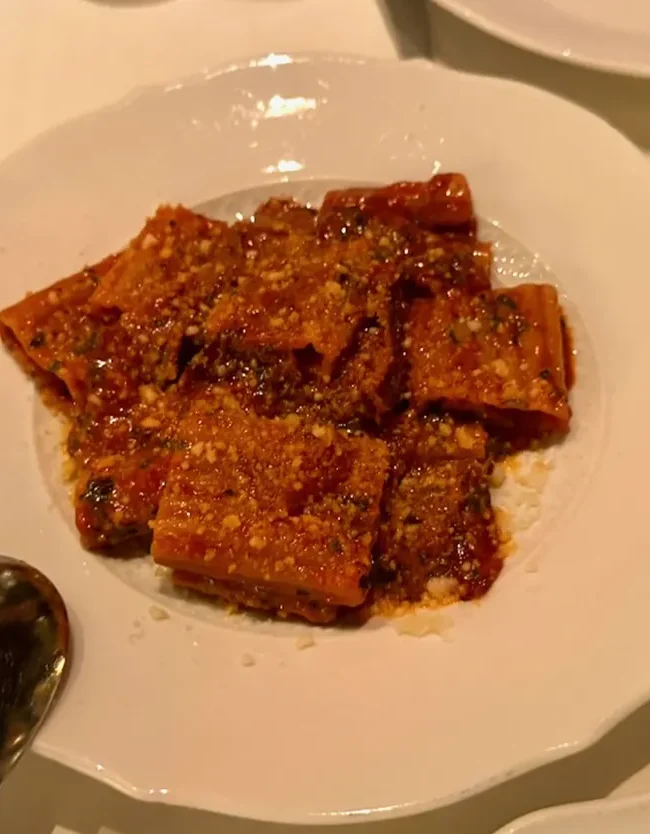 Maccheroni amatriciana at Torrisi Restaurant & Bar in New York City, featuring pasta in a rich tomato sauce