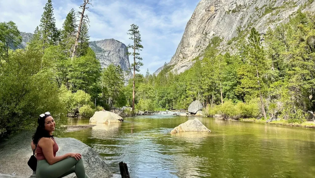 Phoebe Chongchua relaxing beside Mirror Lake in Yosemite National Park.