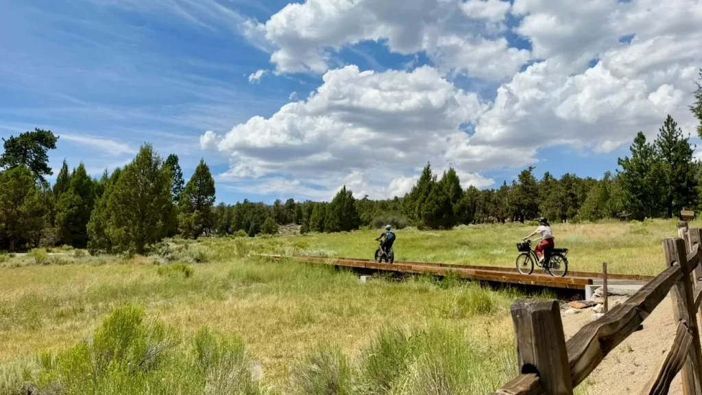 Cyclists riding along the Alpine Pedal Path in Big Bear Lake.