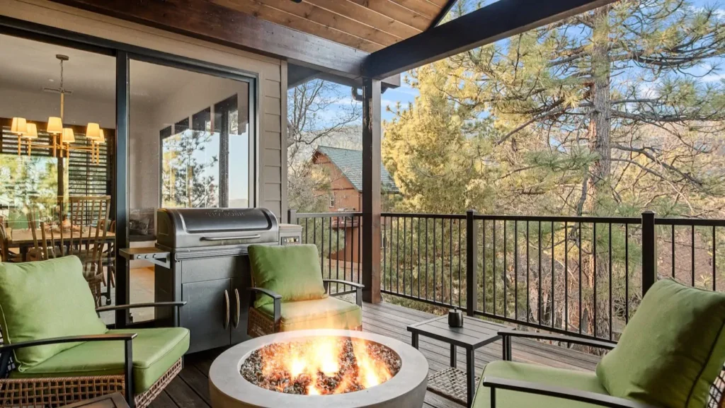 Outdoor deck with fire pit at Ridgecrest Resort in Big Bear Lake.